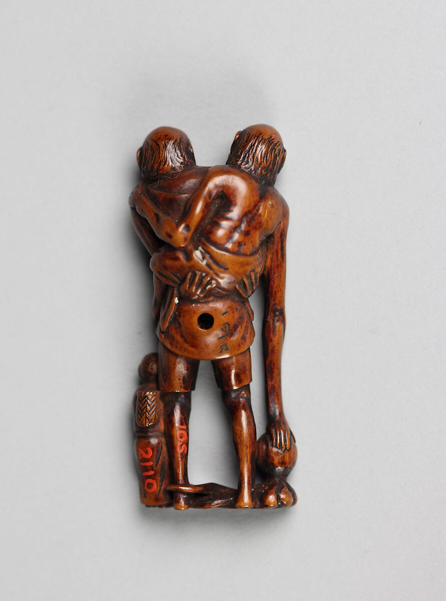 Netsuke: Ashinaga and Tenaga with a Child and an Octopus, Wood, Japan