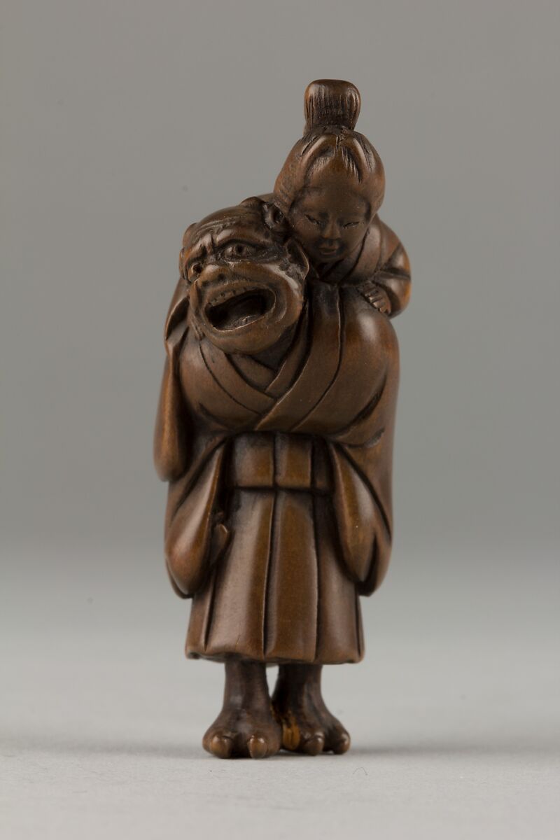 Netsuke of Demon Carrying a Woman on His Shoulders, Wood, Japan 