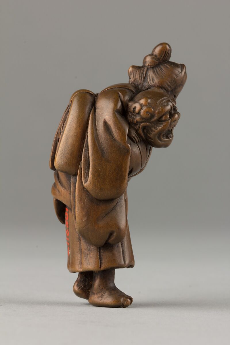 Netsuke of Demon Carrying a Woman on His Shoulders, Wood, Japan