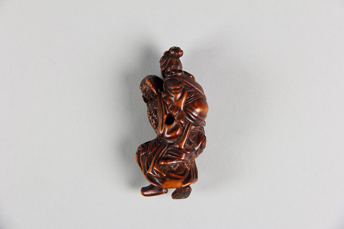Netsuke of Old Man Carrying a Woman on His Back, Wood, Japan