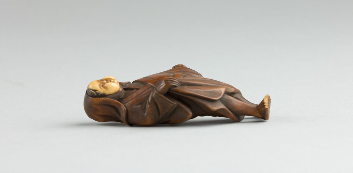 Netsuke of Standing Figure, Wood with ivory mask, Japan