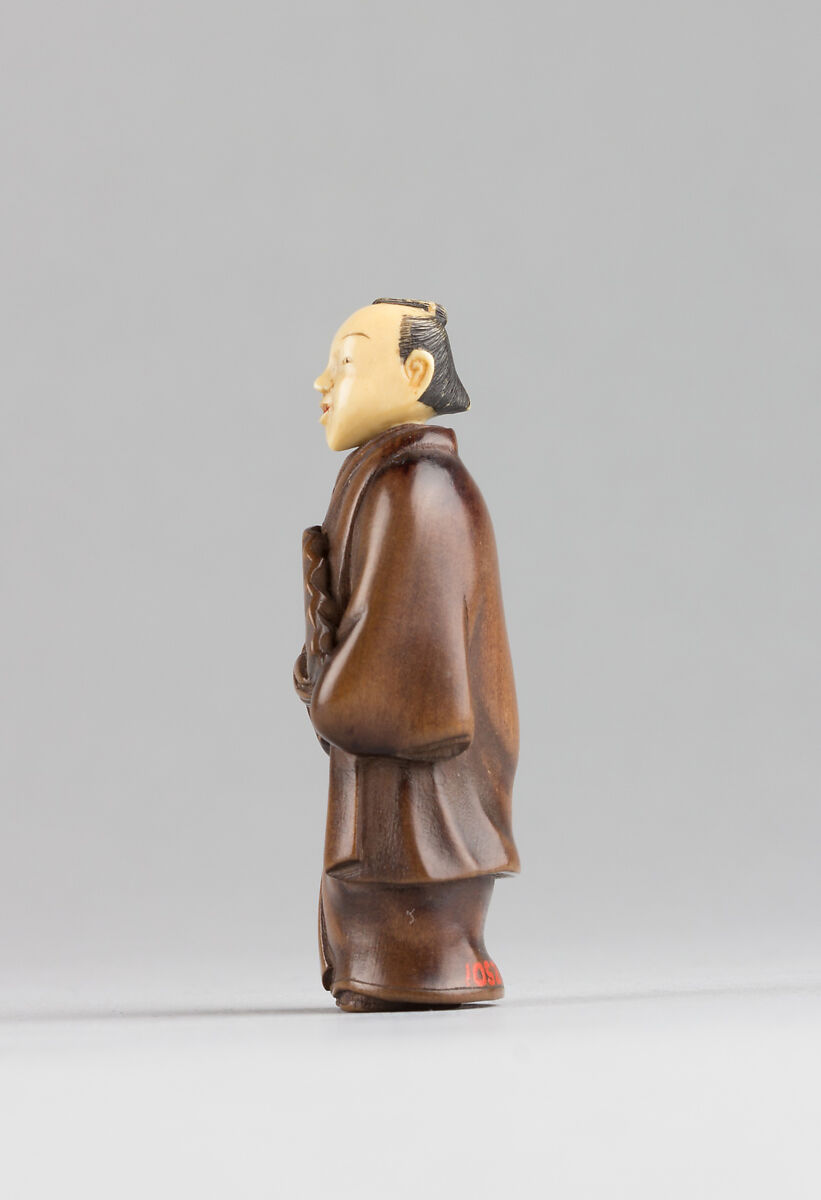 Netsuke of Figure with an Ivory Head, Wood, ivory, Japan