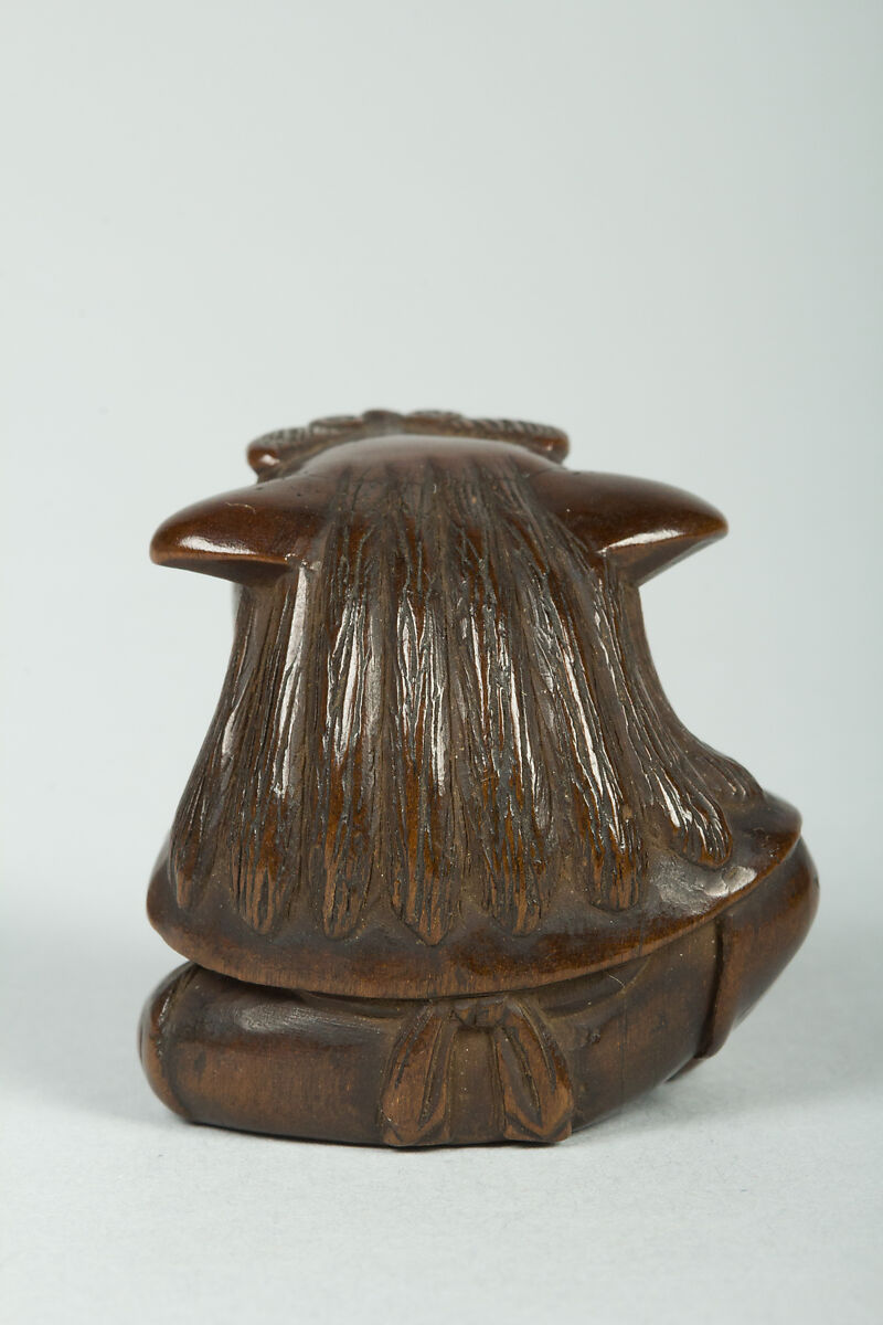 Netsuke of Man Wearing a Mask and Beating a Drum, Wood, Japan