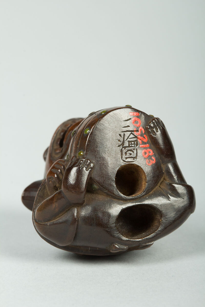 Netsuke of Man Wearing a Mask and Beating a Drum, Wood, Japan