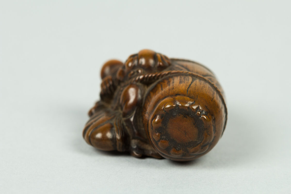 Netsuke of Old Man Carrying a Very Large Acorn, Wood, Japan