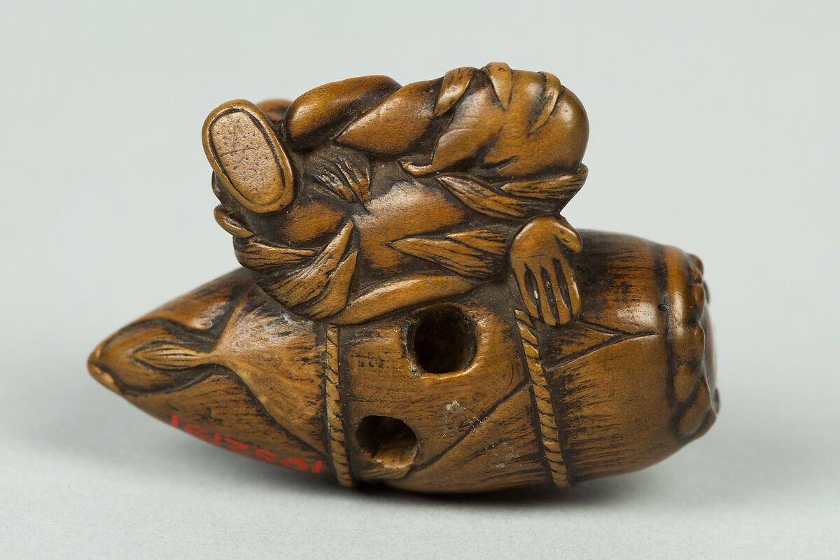 Netsuke of Old Man Carrying a Very Large Acorn, Wood, Japan