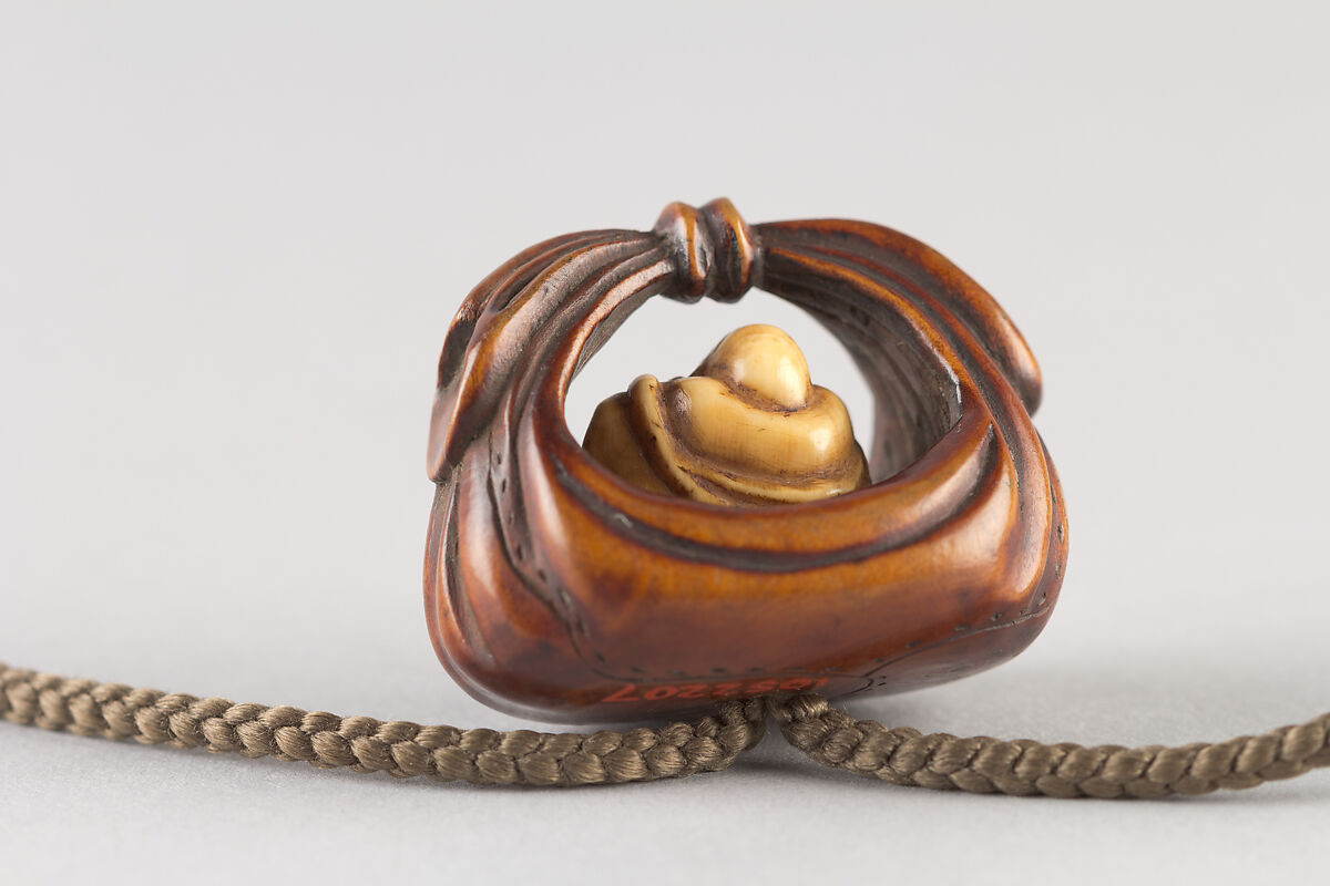 Netsuke of Bag Containing a Figure of Hotei, Wood, ivory, Japan