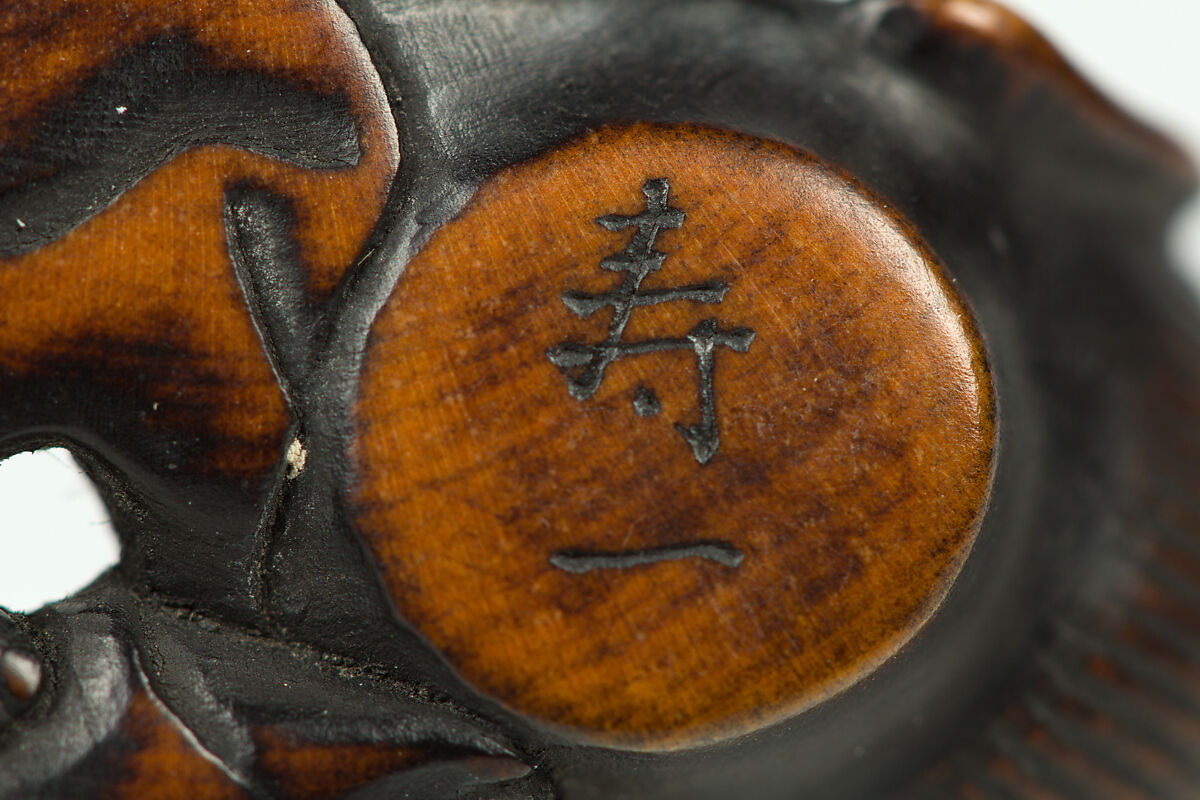 Netsuke of Sculptor Modelling a Large Head, Wood, Japan