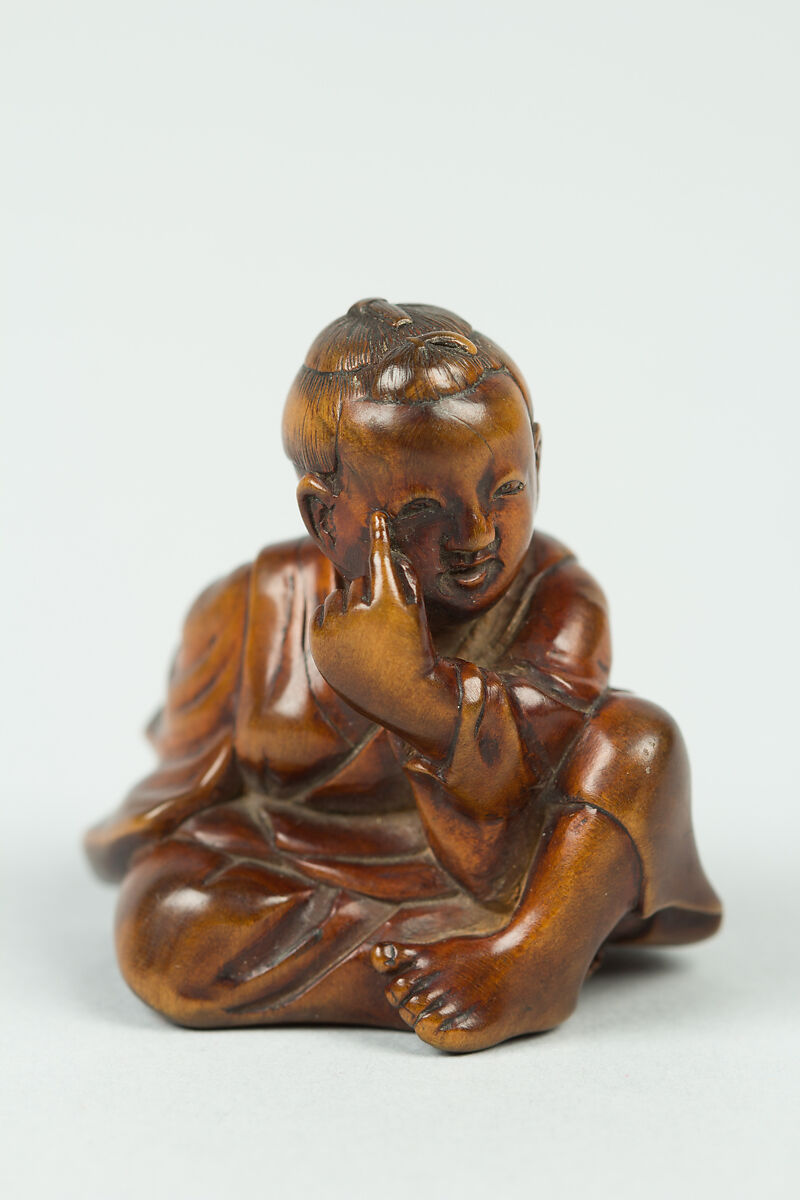 Netsuke of Boy with a Mask, Wood, Japan 