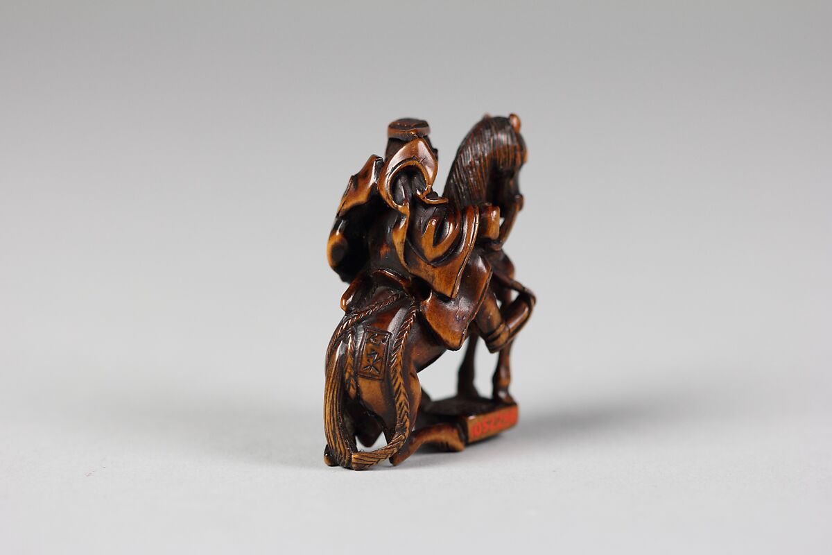 Netsuke of Equestrian Figure on a Go Board, Wood, Japan