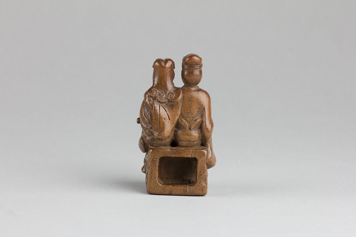 Netsuke of Man and Woman Sitting on a Box, Wood, Japan