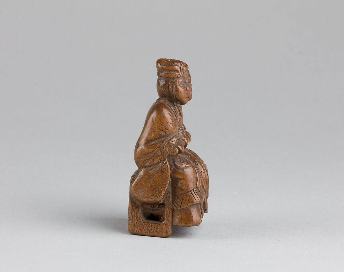 Netsuke of Man and Woman Sitting on a Box, Wood, Japan