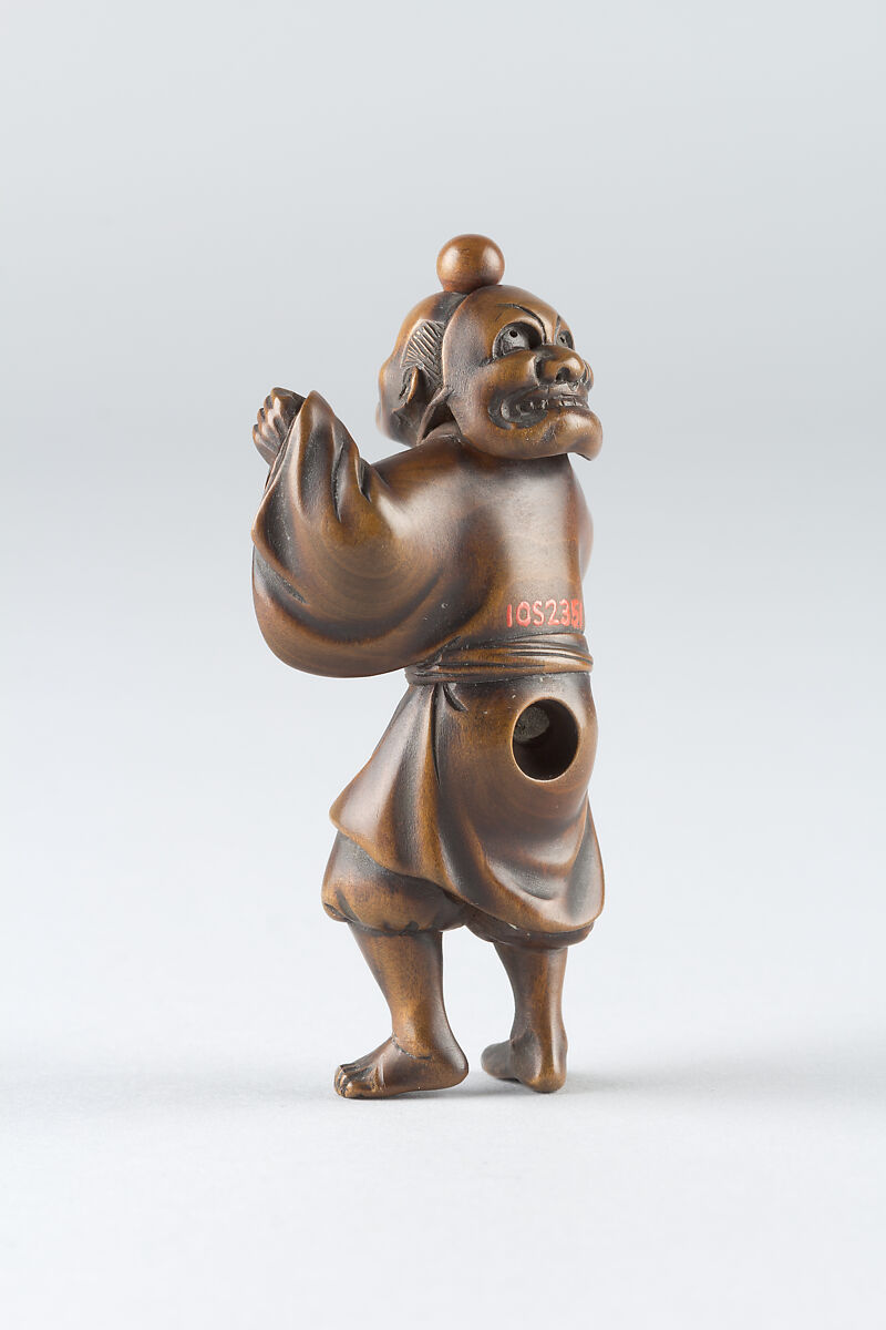 Netsuke of Boy Wearing a Mask, Wood, Japan