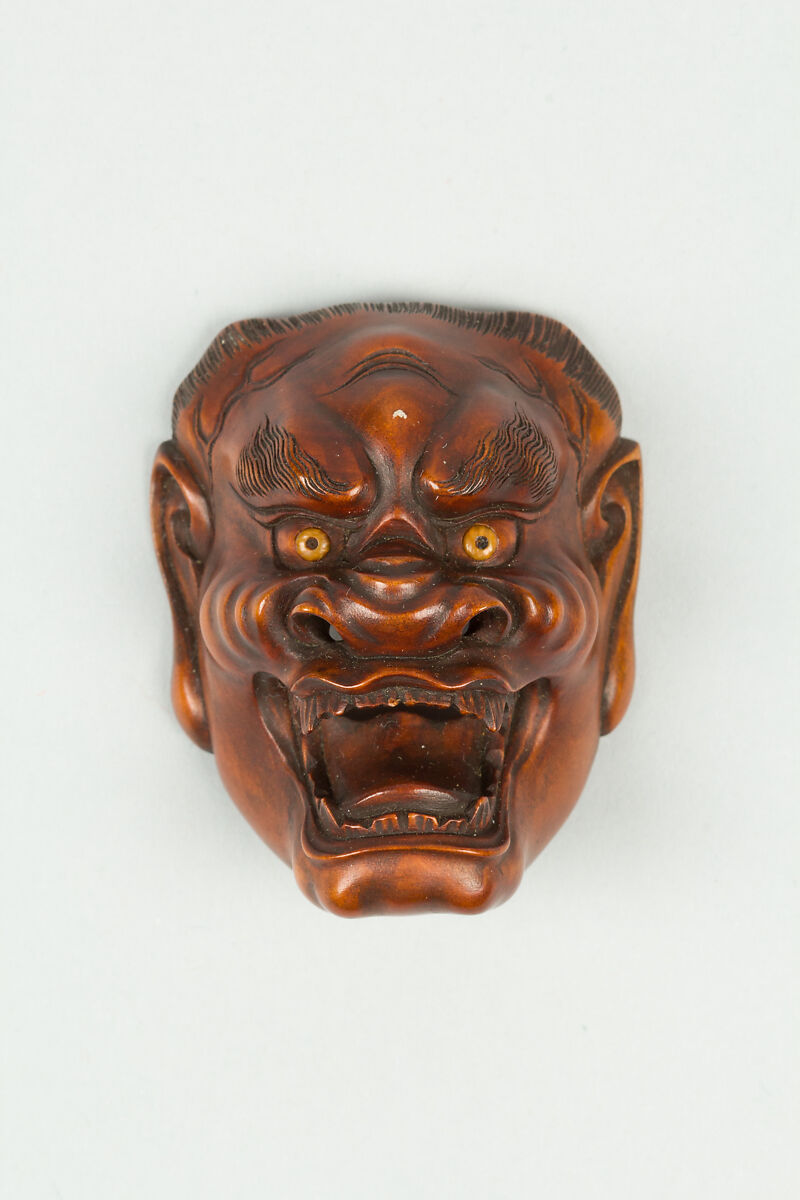 Netsuke of Mask, Wood; dark brown, Japan 