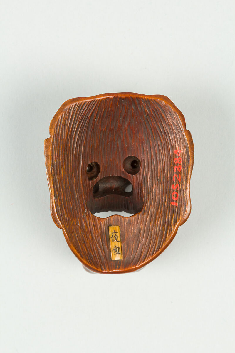 Netsuke of Mask, Wood; dark brown, Japan