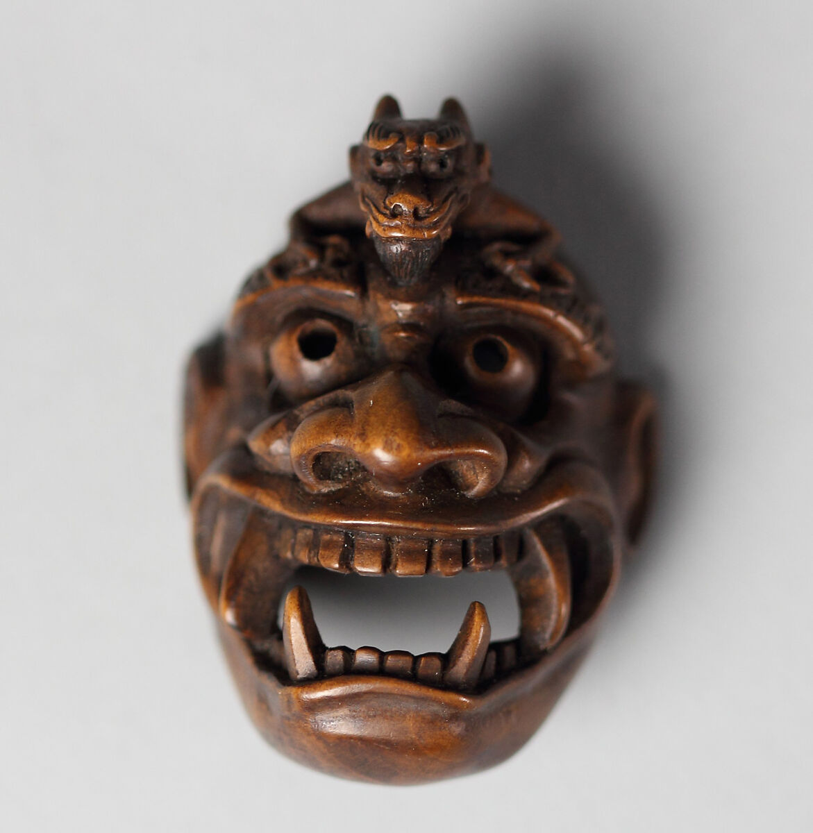 Netsuke of Demon Mask Derived from Bugaku, Wood, Japan 
