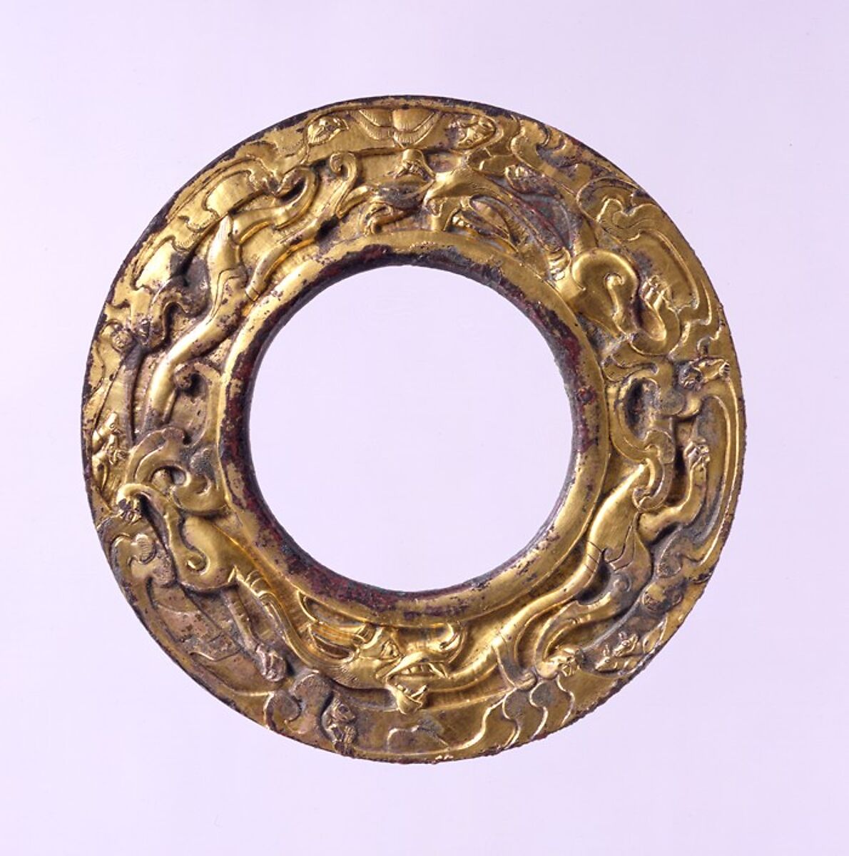 Bridle Fitting with Mythological Landscape, Gilded bronze, North China 