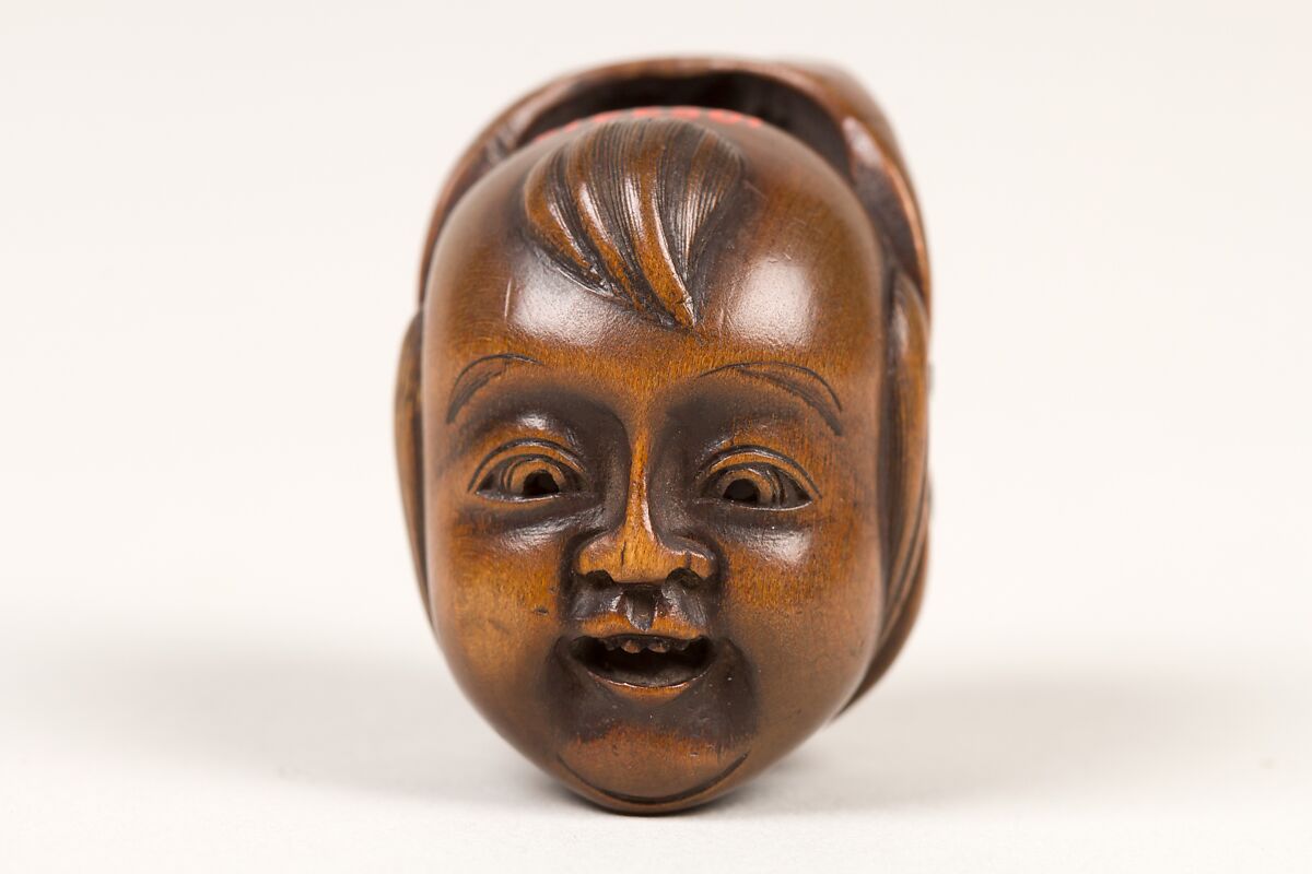 Netsuke of Double Mask, Wood-dark brown, Japan