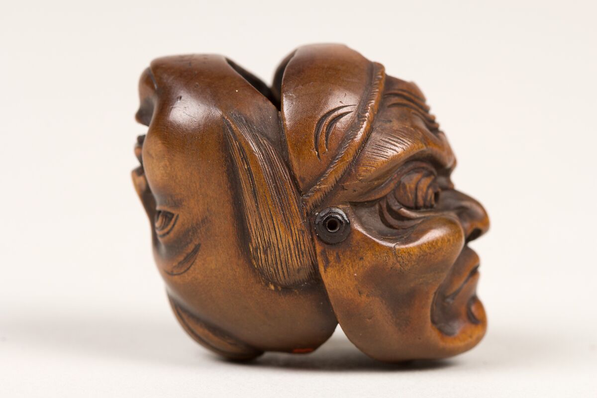 Netsuke of Double Mask, Wood-dark brown, Japan