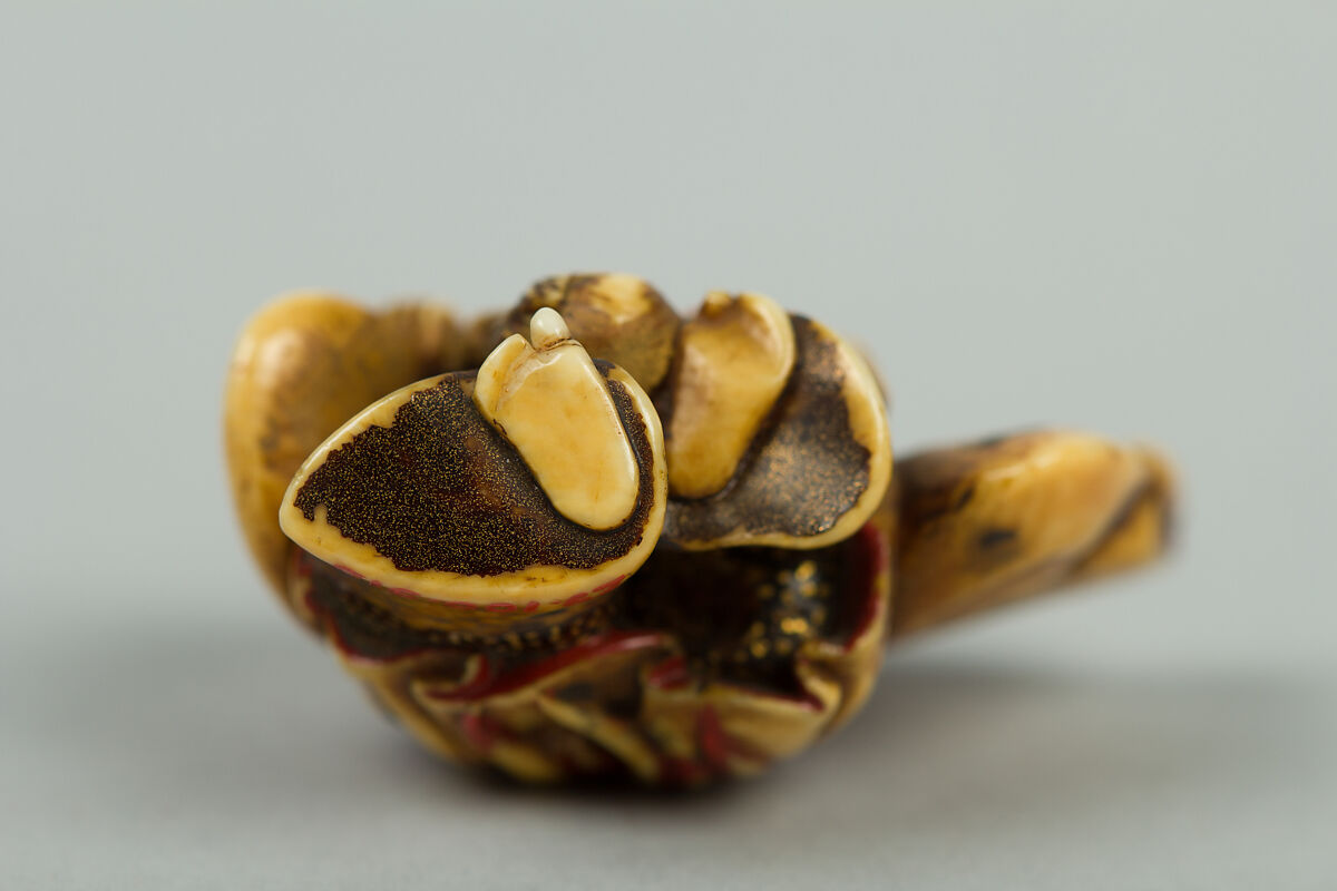 Netsuke of Noh Dancer with Long Red Hair and Peony, Ivory; decoration in gold and red lacquer; face of pink stone, Japan
