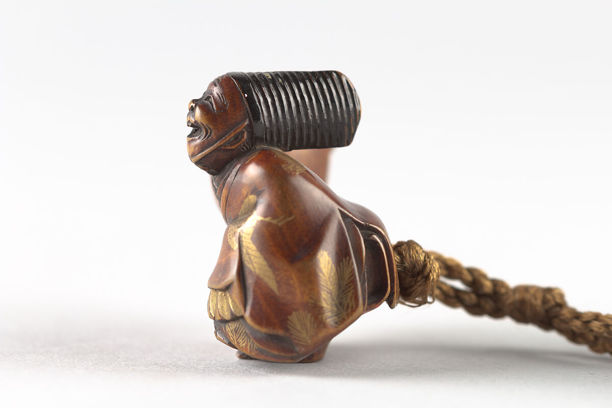 Netsuke of Sambaso Dancer with Bells and Fan, Lacquered wood, Japan