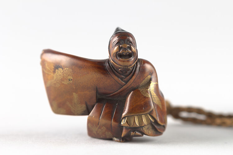 Netsuke of Sambaso Dancer with Bells and Fan