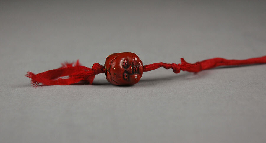 Pair of Ojime, Lacquer, glass, silk, Japan