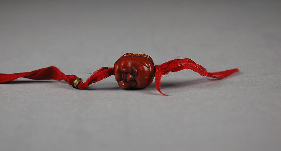 Pair of Ojime, Lacquer, glass, silk, Japan