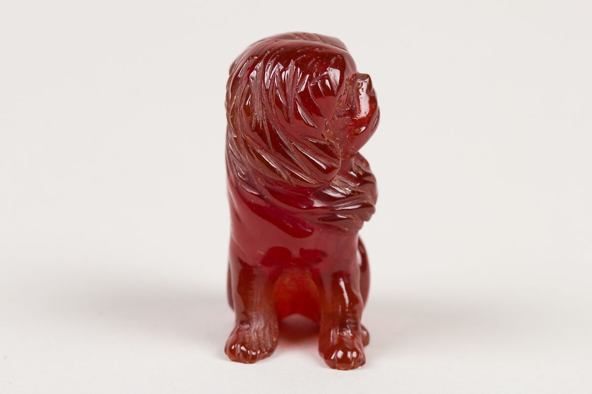 Netsuke of Seated Dog (one of a pair), Amber, Japan