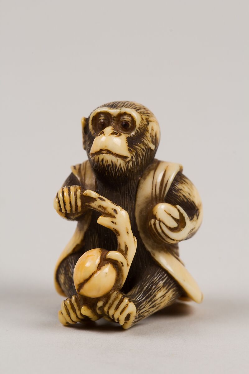 Netsuke in the Shape of a Monkey with a Peach, Ivory, Japan 