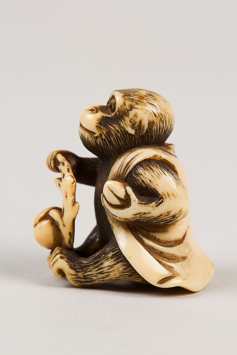 Netsuke in the Shape of a Monkey with a Peach, Ivory, Japan
