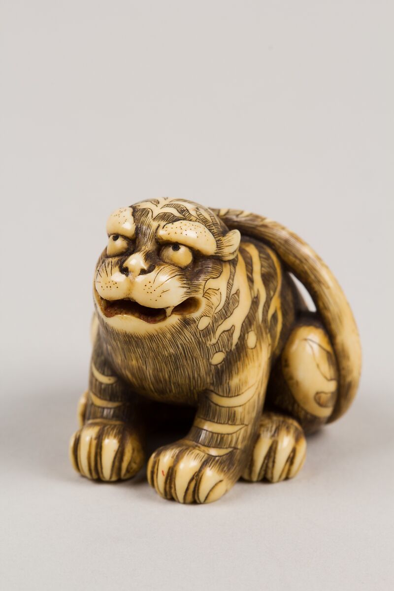 Netsuke of Seated Tiger, Tail Resting on his Back;, Ivory, Japan 