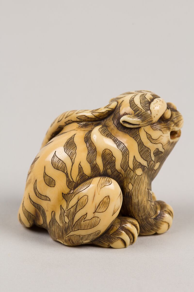 Netsuke of Seated Tiger, Tail Resting on his Back;, Ivory, Japan