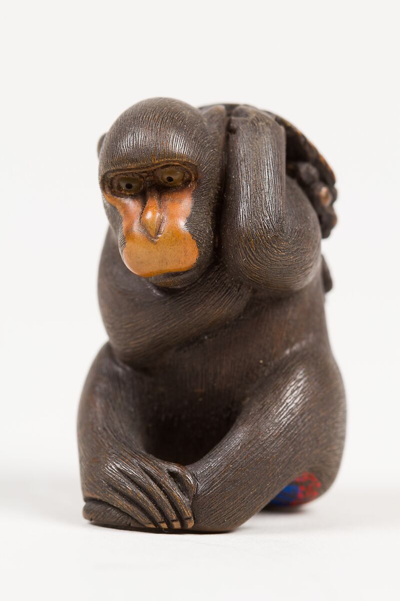 Netsuke of Seated Monkey Carrying a Bunch of Grapes and Leaves, Koichi (Japanese, 19th century), Wood, horn, Japan 