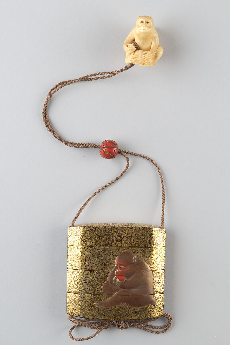 Netsuke of Seated Monkey with Persimmon, Ivory, Japan