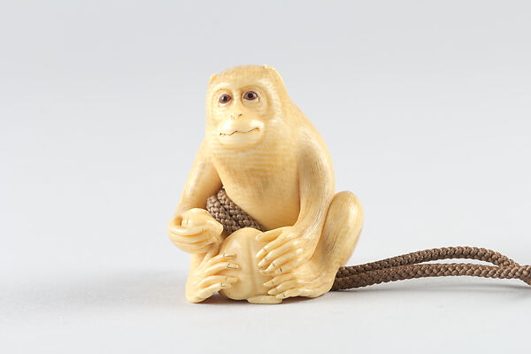 Netsuke of Seated Monkey with Persimmon
