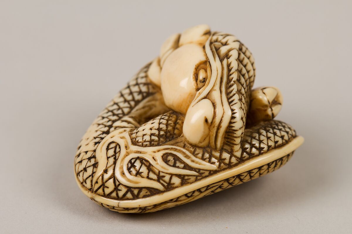 Netsuke of Coiled Dragon Enclosing a Pearl, Ivory, Japan