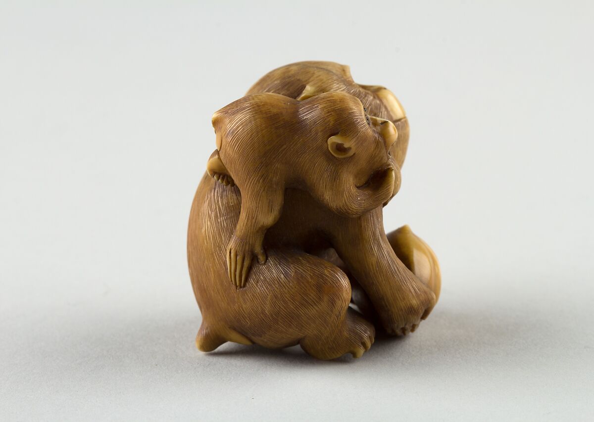 Netsuke of a Female Monkey Holding a Nut while her Baby Crawls on her Back, Masatami, Ivory, horn, Japan