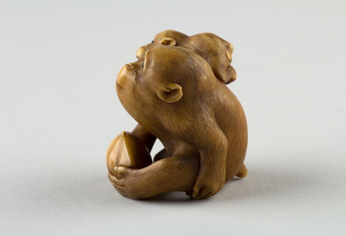 Netsuke of a Female Monkey Holding a Nut while her Baby Crawls on her Back, Masatami, Ivory, horn, Japan