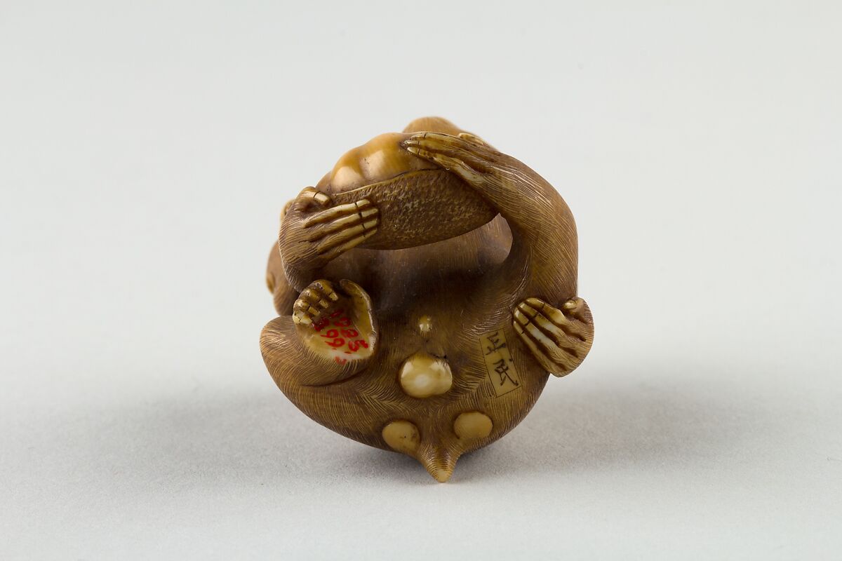 Netsuke of a Female Monkey Holding a Nut while her Baby Crawls on her Back, Masatami, Ivory, horn, Japan