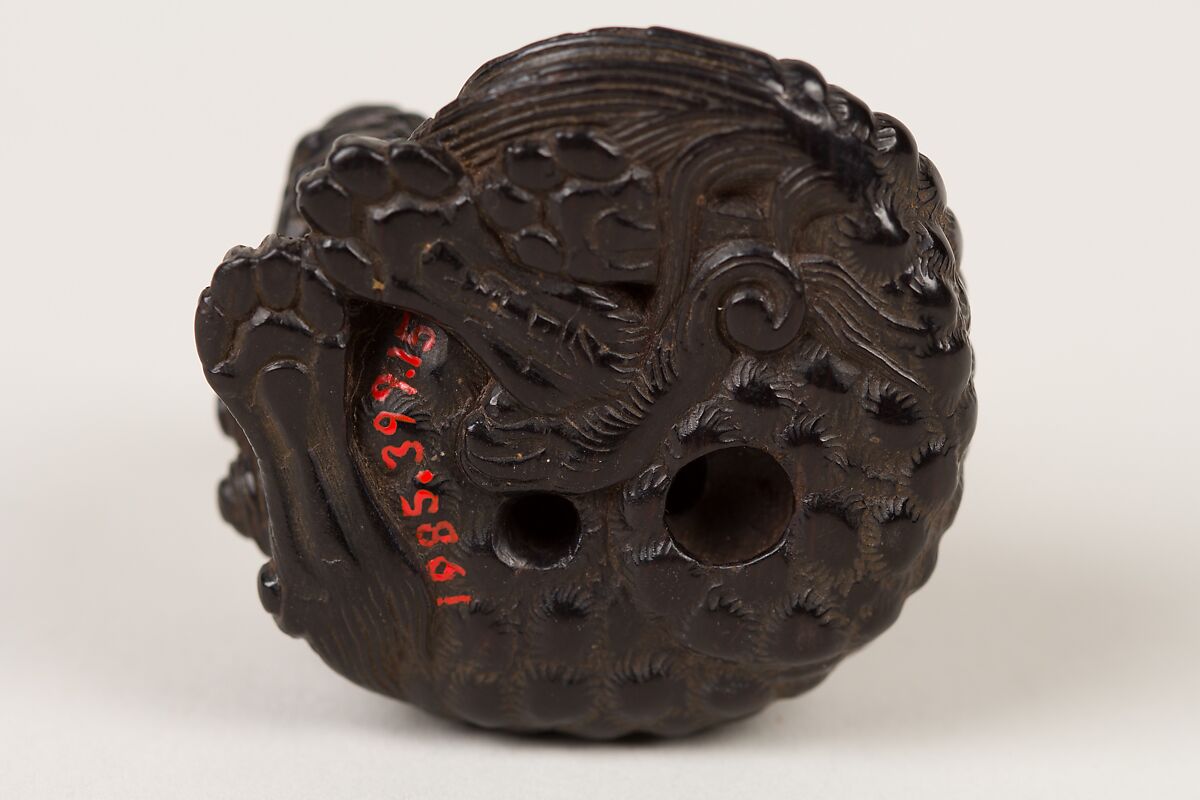 Netsuke of a Seated Shishi, Nanyō, Ebony, Japan