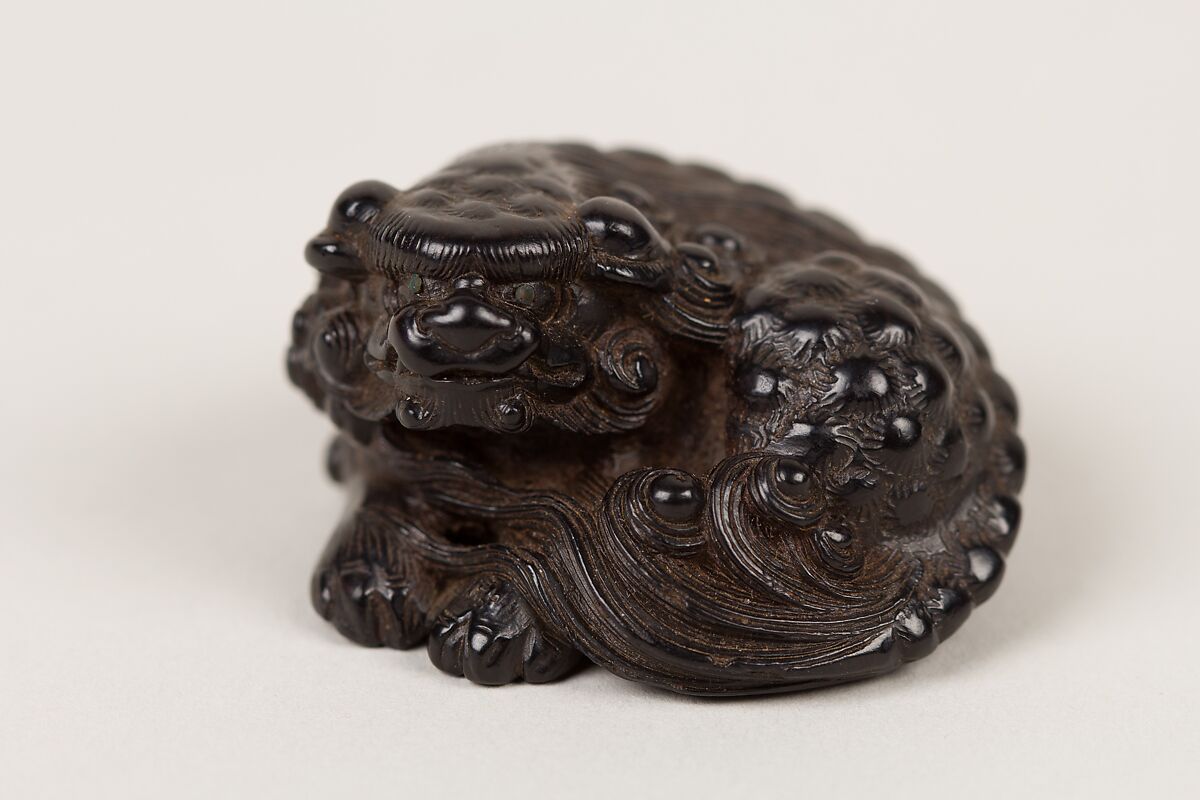 Netsuke of a Seated Shishi, Nanyō, Ebony, Japan 