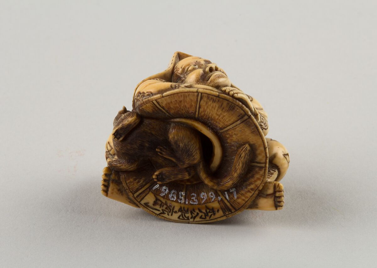 Netsuke of a Hunter Trying to Catch a Fox Beneath a Straw Hat, Shūōsai, Ivory, Japan