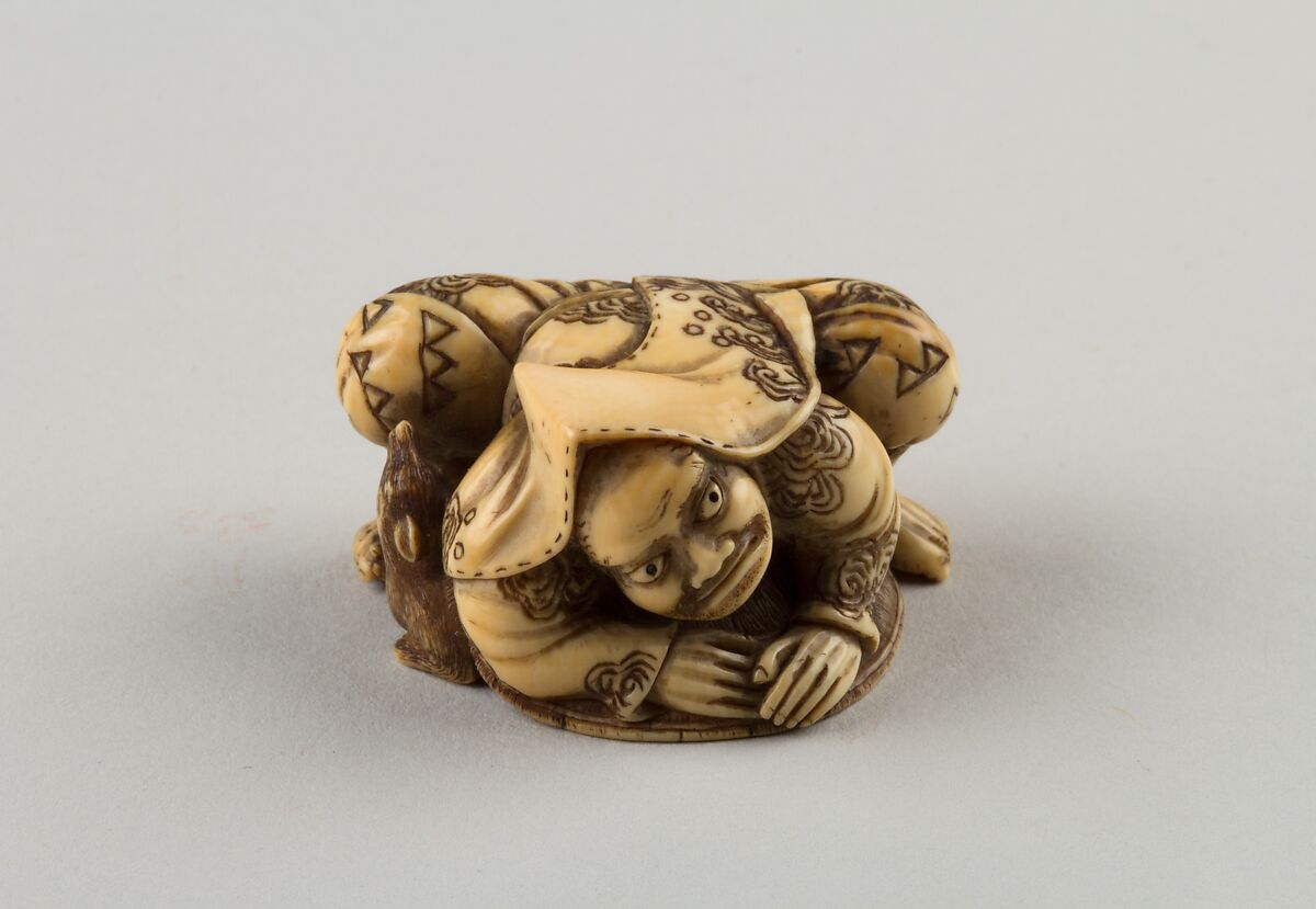 Netsuke of a Hunter Trying to Catch a Fox Beneath a Straw Hat, Shūōsai, Ivory, Japan 