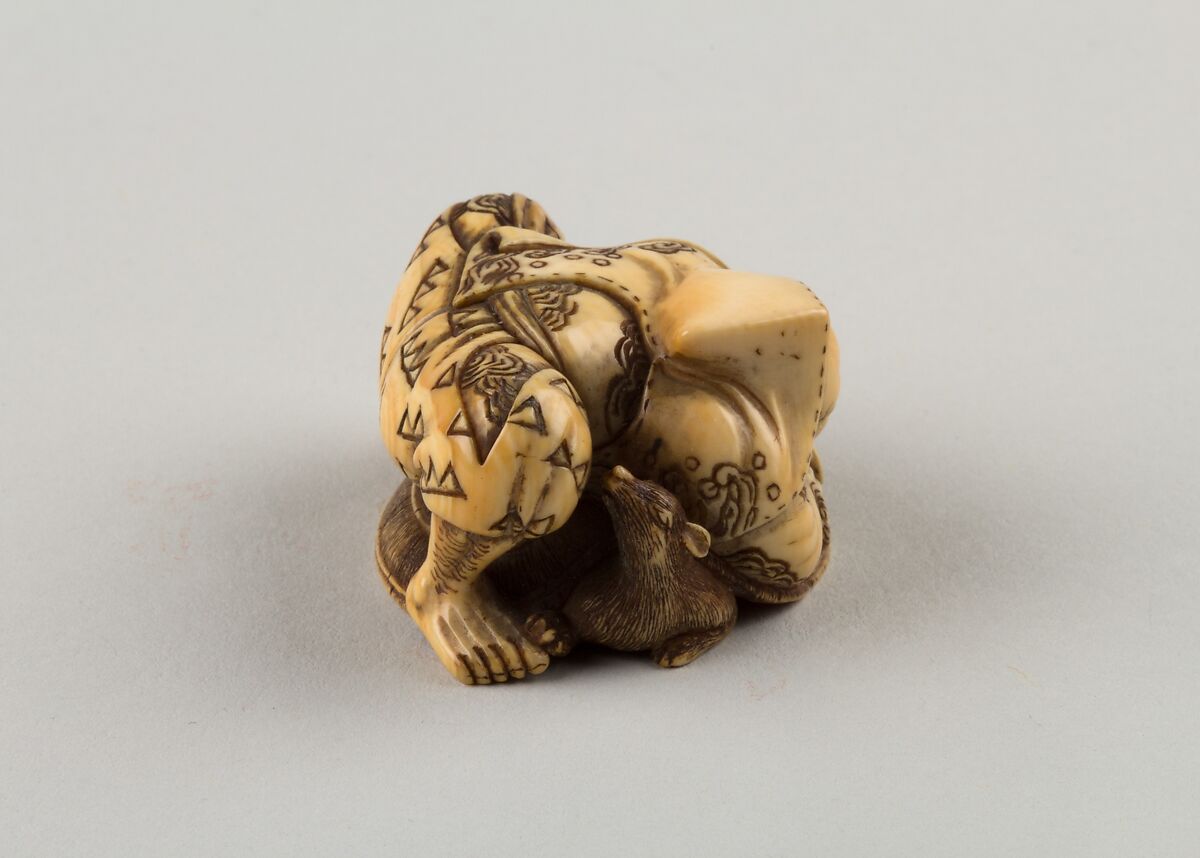 Netsuke of a Hunter Trying to Catch a Fox Beneath a Straw Hat, Shūōsai, Ivory, Japan