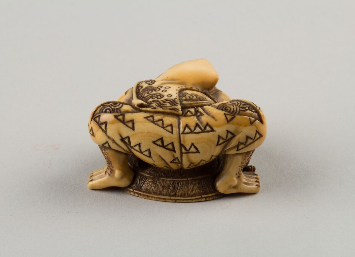 Netsuke of a Hunter Trying to Catch a Fox Beneath a Straw Hat, Shūōsai, Ivory, Japan