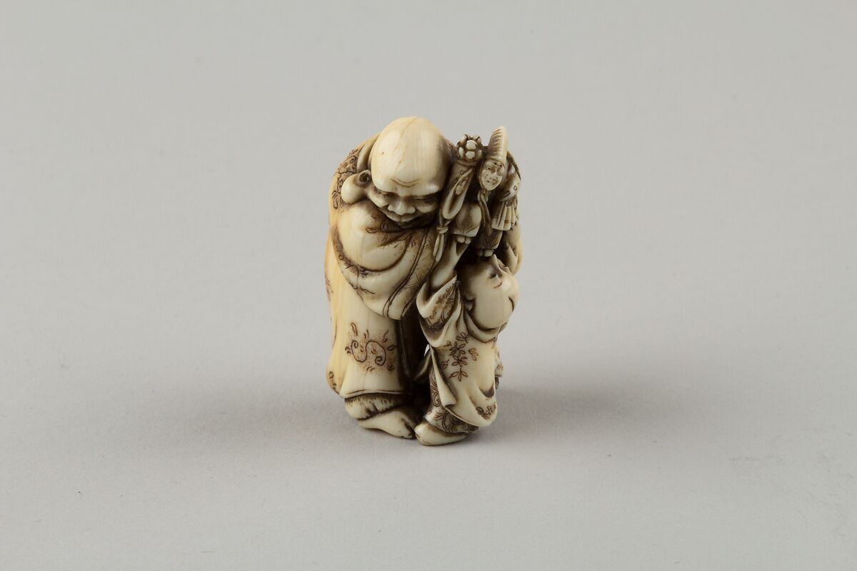 Masahide | Netsuke of Man and Two Children with a Sambaso Dancer 