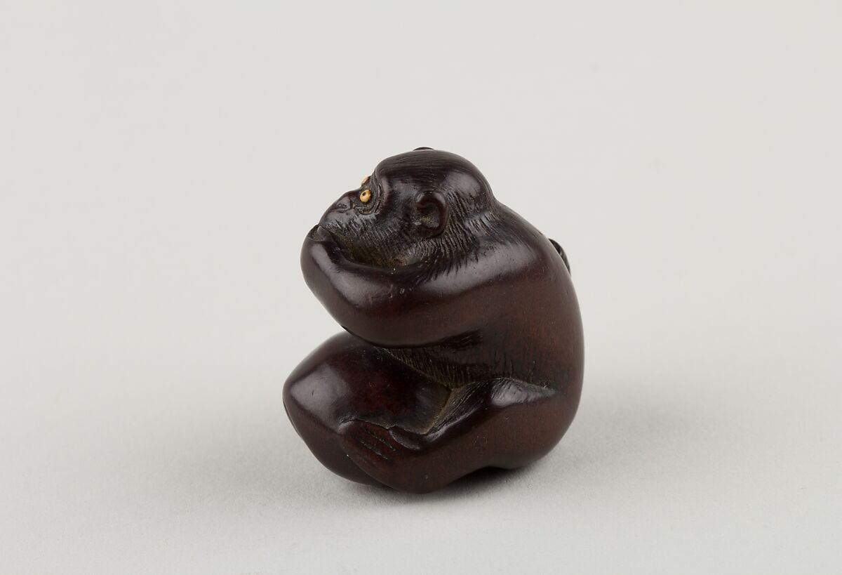 Netsuke of Monkey with One Hand over Mouth, the Other Behind His Back, Miwa, Ebony, ivory inlay, Japan