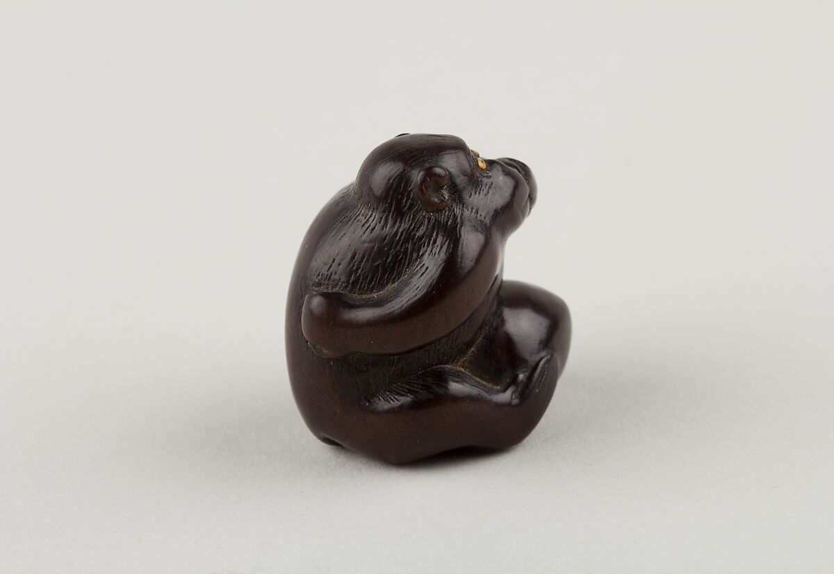 Netsuke of Monkey with One Hand over Mouth, the Other Behind His Back, Miwa, Ebony, ivory inlay, Japan
