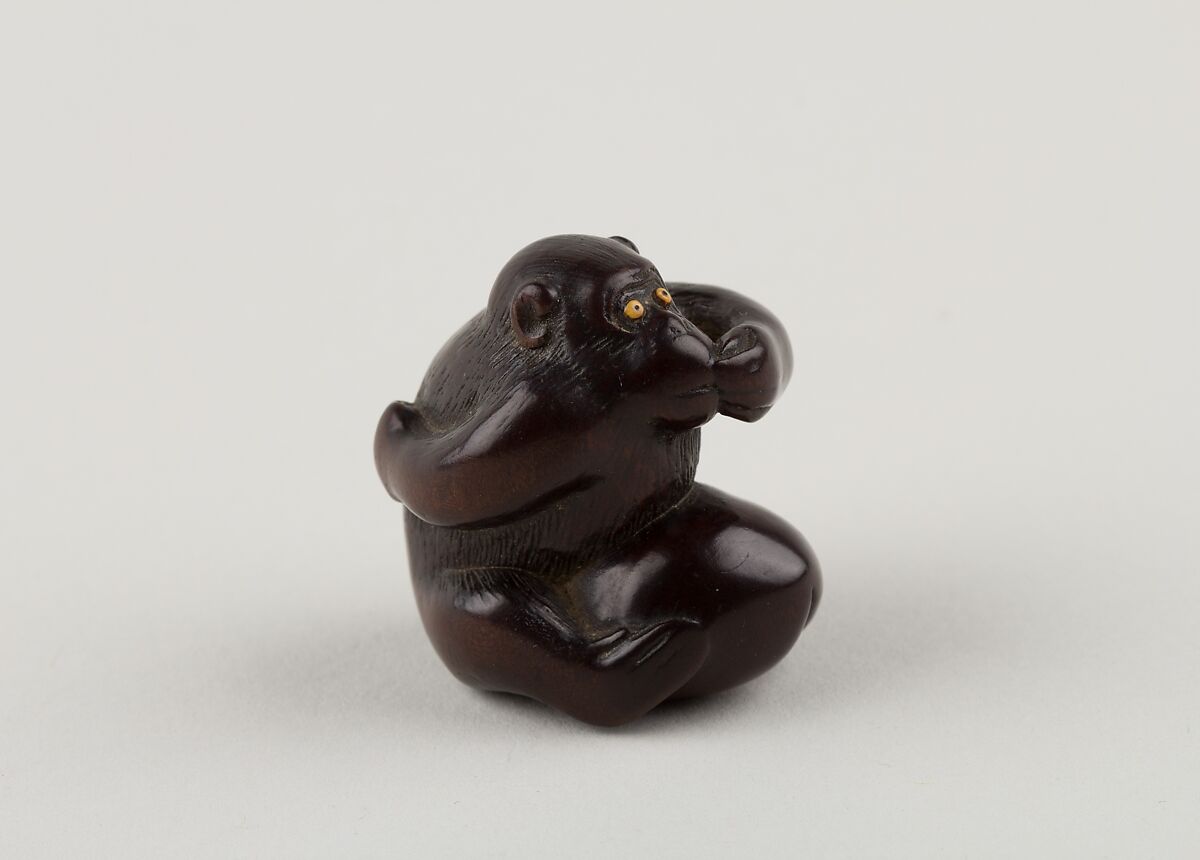 Netsuke of Monkey with One Hand over Mouth, the Other Behind His Back, Miwa, Ebony, ivory inlay, Japan 